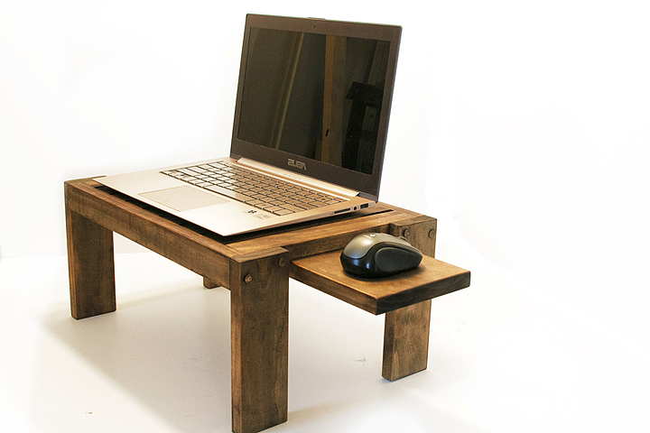 laptop stand on desk